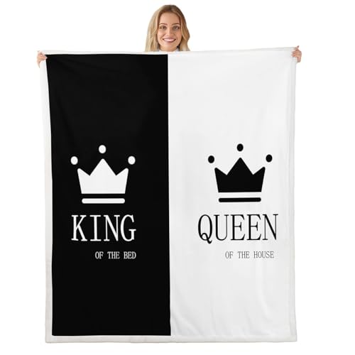 Two matching black-and-white crown-print sherpa throws — the pair that makes this the best sherpa blanket for couples pick