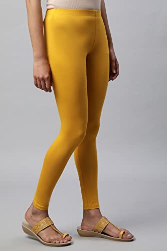 Image of Aurelia Yellow Solid Cotton Blend Leggings for Women