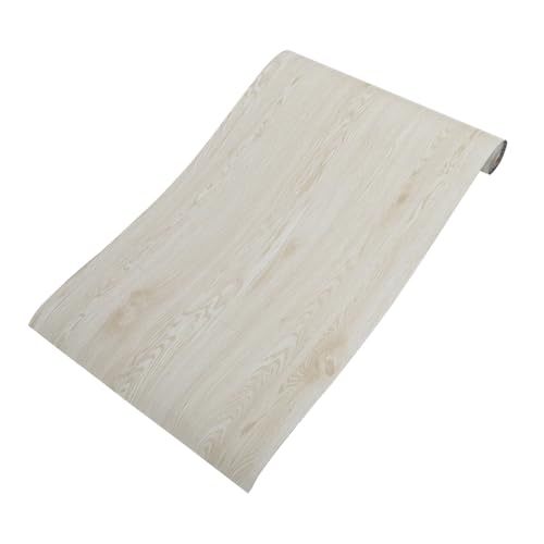 Revêtement de sol en PVC autocollant pour masquer un vieux carrelage abîmé
