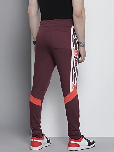 Image of The Indian Garage Co Men Slim Fit Placement Print Mid-Rise Knitted Joggers