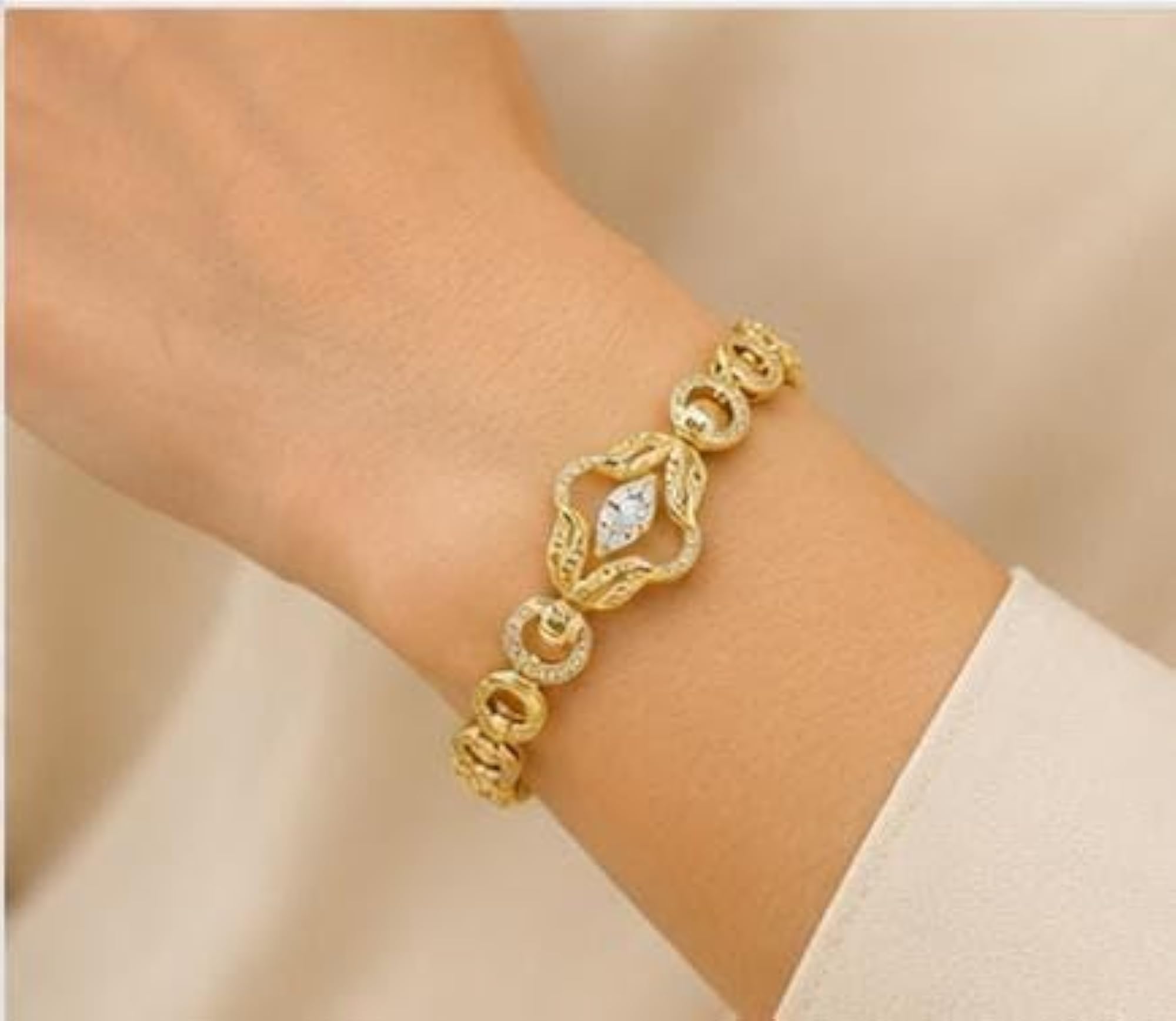 Gold-Toned CZ Floral Bracelet with Infinity Links