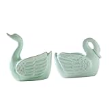Pot de fleurs en forme de cygne : le design en forme de cygne rend le pot de fleurs en céramique charmant et décoratif.