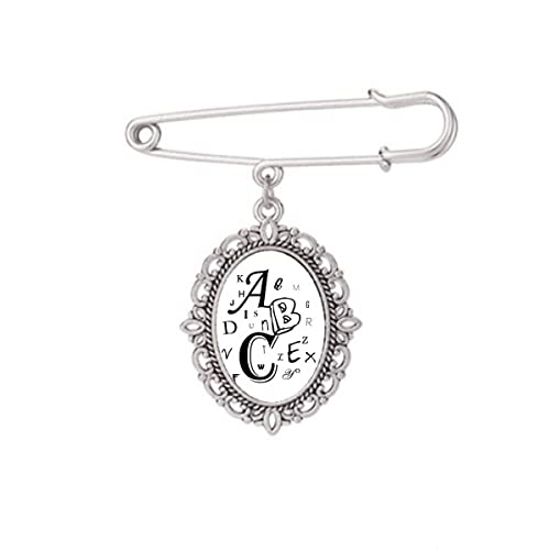 Broche lettres anglais Art Déco pour sublimer un châle en soirée