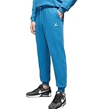 Optez pour le jogging de la marque NIKE JORDAN ! - Coloris : Bleu - Poches latérales - Poignets côtelés - Logo brodé - Composition : 80 % coton / 20 % polyester