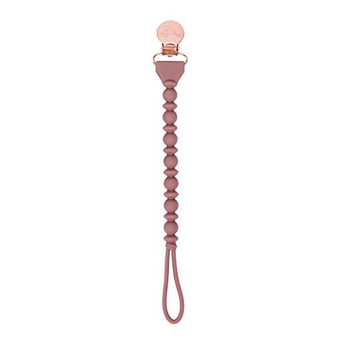 Image of Itzy Ritzy Silicone Pacifier Clip; 100% Silicone Pacifier Strap with Clip Keeps Pacifiers, Teethers & Small Toys in Place; Features One-Piece Beaded Design & Silicone Cord, Rosewood + Rose Gold Clip