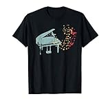 pianoforte giocattolo epoca Grande pianoforte con bellissimi colori vintage per pianista con spartiti