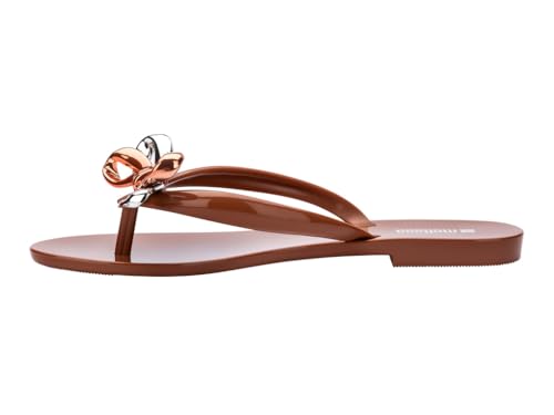 Melissa Harmonic Eclipse Womens Fashion Sandals - Dressy Flip Flops with Metallic Bow - Lightweight PVC, Flexible Design - Summer Sandals for Women, Flat & Flexible, Brown, 5