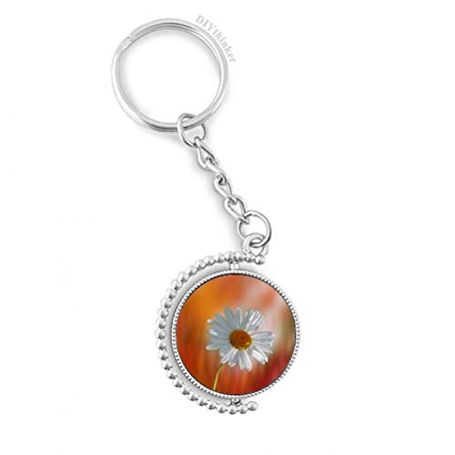 Llavero de cadena rotativo con flores decorativas en naranja y blanco