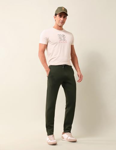 Image of U.S. Polo Assn. Men's Green Solid Mid Rise Cotton Drawstring Slim Fit Flat Front Slit Pocket Track Pants