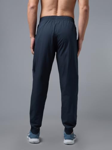 Image of TECHNOSPORT Men's Regular Fit Joggers with Zip Pockets, TECHNOLITE Quick Dry Stretchable Lightweight Track Pants for Gym Running and Casual Wear