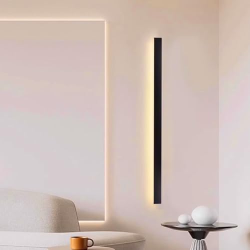 Aplique de pared LED lineal de 60cm en aluminio negro con luz cálida para dormitorio