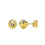 Pendientes delicados en oro con acabado redondeado. Oro amarillo 18 k (750). Tipo cierre: Presión. Diámetro(mm): 7