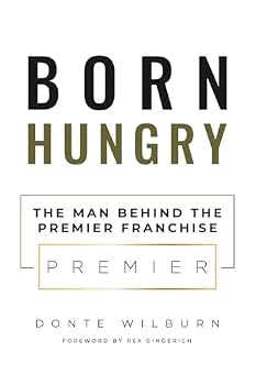 Paperback Born Hungry: The Man Behind the Premier Franchise Book