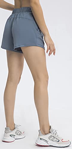 Image of Ukaste Women's Stretch Workout Running Athletic Shorts with Pockets - 3 Inch