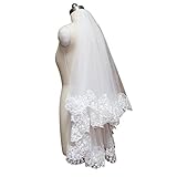 vestido de novia ivory o blanco Este simple pero elegante velo nupcial presenta un borde de corte.