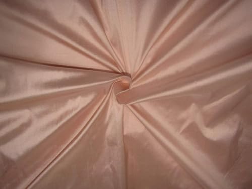 Soie Dupion rose pêche 137 cm : le tissu idéal pour des volumes parfaits