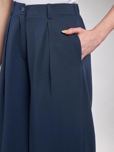 Image of SASSAFRAS Women's Relaxed Wide-Leg Pants - Modern Chic, Comfortable Everyday Outfit for Women
