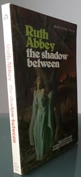 Paperback The Shadow Between Book