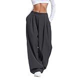 Coupe ample et jambes larges offrant un style décontracté et une liberté de mouvement totale pour les activités quotidiennes, de loisirs ou sportives.