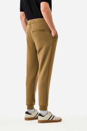 Image of SNITCH Men Track Pants | Relaxed Fit with Contrast Side Stripes & Zippered Pockets | Polyester Blend Fabric for Athletic & Street Wear | Stretchable & Comfortable Design