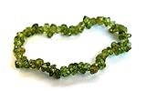 Elastisches Armband mit Reiki-Energie geladenem Peridot-Kristall – als Geschenk verpackt mit Kristall-Beschreibung