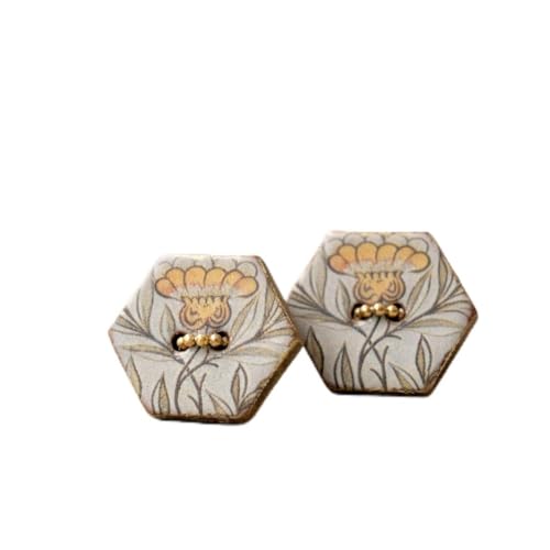 Marigold�b�ߌ�̒�ɂ��ڂꂽ�Ԃ̃C�������O �p��������{�^���ƌX������