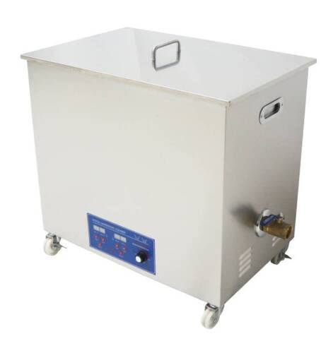 Angled view of the 58L Industrial Ultrasonic Cleaner, highlighting the drain valve on the side.