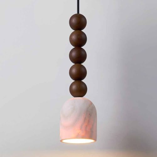 Lámpara colgante de piedra natural para iluminar con calidez el dormitorio
