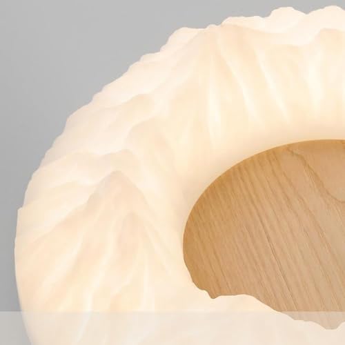 Plafond rond dimmable blanc pour optimiser l'éclairage du salon