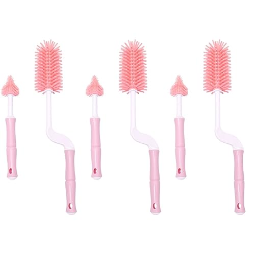 Brosse à biberon et goupillons roses pour l'hygiène des repas de bébé à la maison