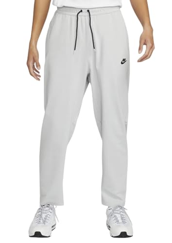 Image of Nike Men's Regular Fit Mid Rise Track Pant