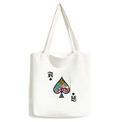 Sac à main fleurs et feuilles de poker aux finitions soignées