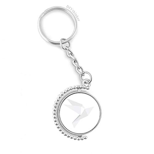 Llavero giratorio de paloma origami blanca para organizar tus llaves con estilo sutil
