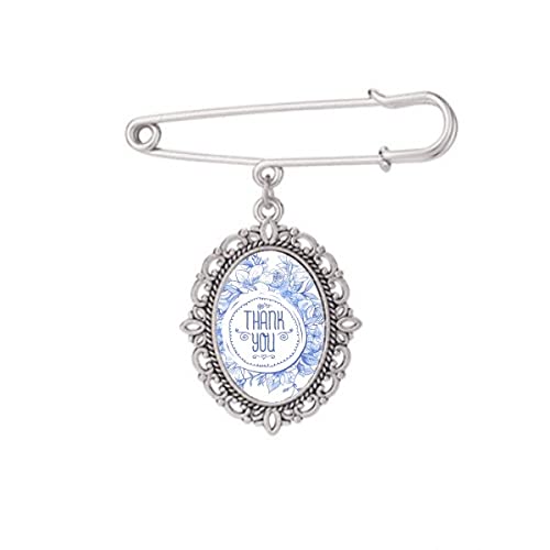 Broche motif de roses bleues pour sublimer un châle en soirée