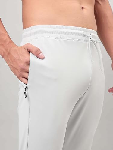 Image of TECHNOSPORT Men's Slim Fit Track Pants with Zip Pockets, ELASTO Plus Quick Dry Stretchable Lightweight Lower for Gym Running Yoga and Sports