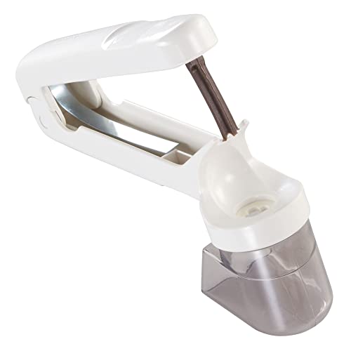 A hinged cherry/olive pitter with a built-in stone catcher — surprisingly satisfying single-purpose tool that actually works cleanly.