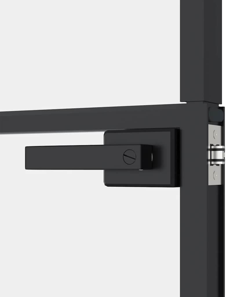 클로즈업 view of the modern black door handle and latch.