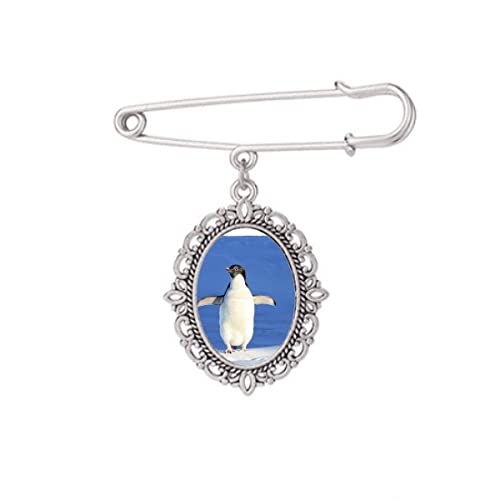 Broche pingouin blanc pour ajuster une robe ou fixer un châle qui glisse