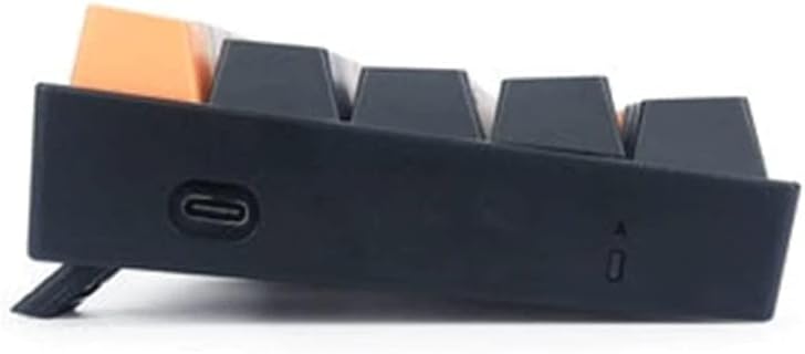 Redragon K606 keyboard with removed keycaps and switches