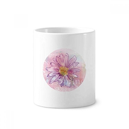 Stylo et brosse à dents bien rangés grâce au gobelet céramique fleur chrysanthème
