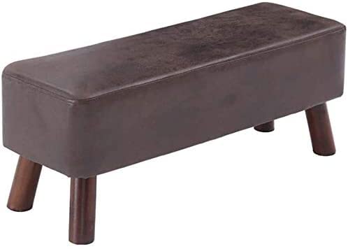 Repose-pieds tabouret bas marron avec petits pieds en bois rembourrés