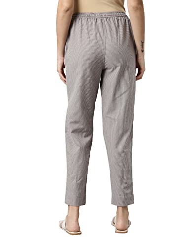 Image of GO COLORS Ikat Print Beige Printed Pencil Pant for Women | Breathable, Side Pocket