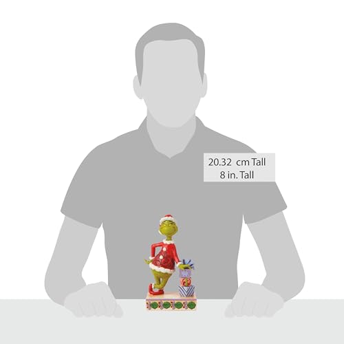 Enesco Estatueta do Dr. Seuss Grinch de Jim Shore Papai Noel Grinch apoiado na pilha de presente, es