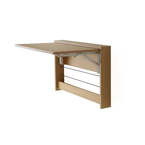 Bureau mural pliable gain de place pour optimiser les petits studios et cuisines