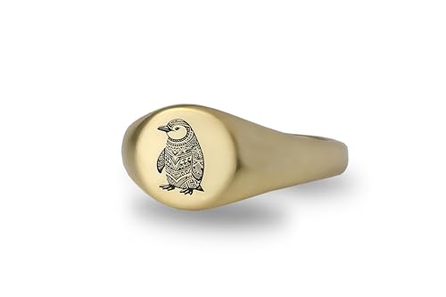 Bague en or pour pingouin gravée à la main, un bijou d'animaux d'exception