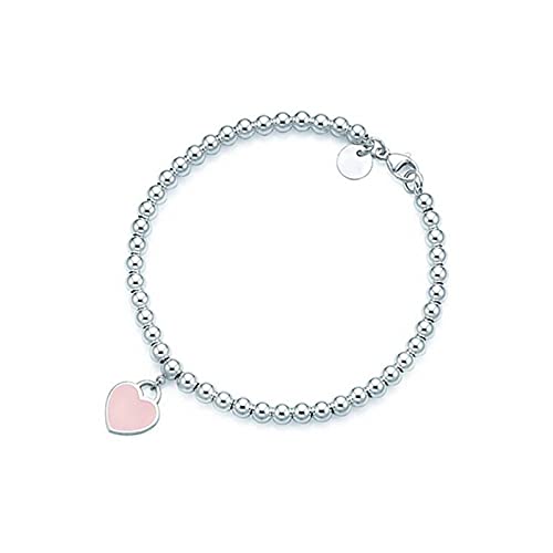 Style quotidien chic : bracelet double cœur HHRFCS et perles rondes