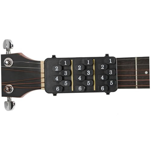 Presseur d'accords de guitare pour débutant sur guitare pleine taille