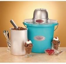 Components of the ice cream maker: bucket, motor, dasher, and canister