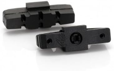 Close-up of an XLC BS-X06 brake pad showing the mounting point and textured braking surface.