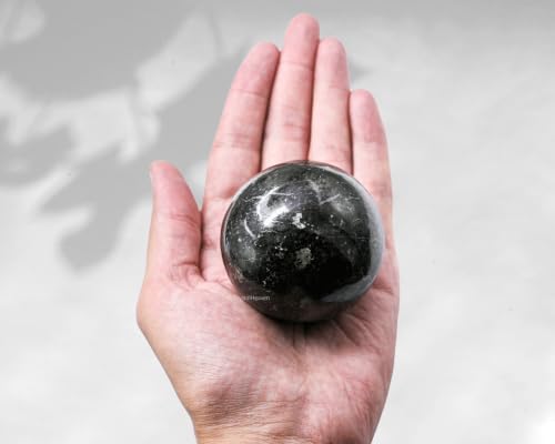 Image of Certified Nuummite Crystal Ball for Meditation - Premium Crystal Vastu Items for Home and Feng Shui Items for Good Luck - Ideal for Pooja Supplies and Spiritual Practices (2.5 inch Inch)